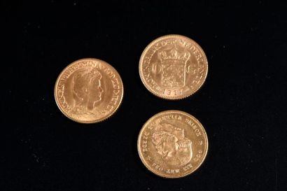 null Trois pièces de 10 guldens hollandais en or jaune.