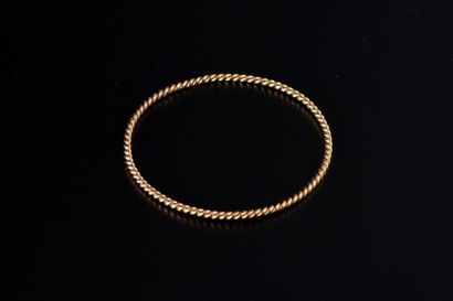 null Bracelet rigide en or jaune 750 millièmes formé de deux brins torsadés.
Diam....