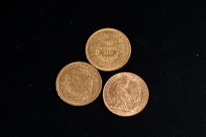 null Trois pièces en or jaune de vingt francs.