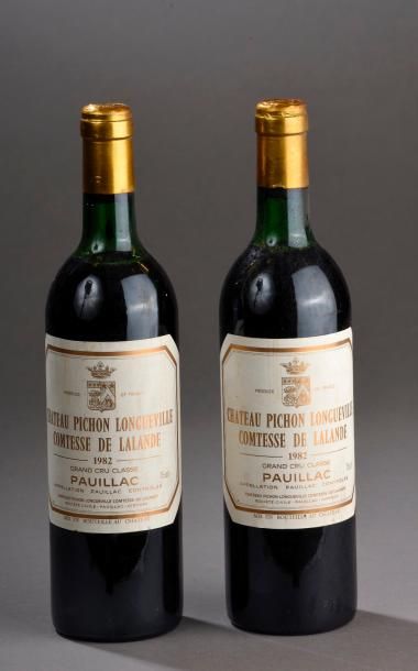 null 2 bouteilles CH. PICHON-LONGUEVILLE-COMTESSE, 2° cru Pauillac 1982 (etlt, 1...