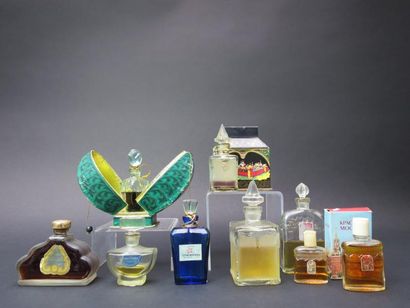 null Parfumerie russe
Lot composé de neuf flacons dont deux dans leur coffret illustré...