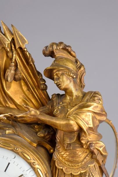 null Pendule dite « Coriolan et Véturie » en bronze ciselé et doré (usures). Le cadran...