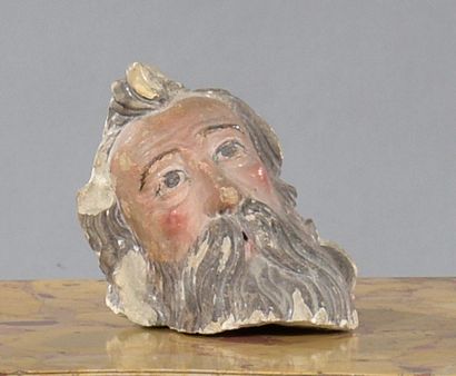 null Tête en calcaire sculpté et peint d'un personnage barbu (manques).

XVIIe ou...