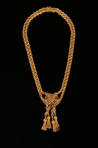 null Collier en or jaune 18K à deux rangs de maille corde faussement noués en leur...