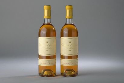 null 2 bouteilles Château D'YQUEM, 1° cru supérieur Sauternes 1986 (1 TLB).