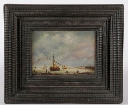 null École hollandaise du XIXe siècle.

Pêcheurs et bateaux. 

Huile sur toile signée...