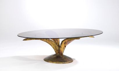 null François MELIN (XXe siècle).

Table basse, le piètement à décor de quatre feuilles...