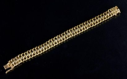 null Bracelet à maille américaine en or jaune 18K (légers chocs).

Long. : 18 cm...