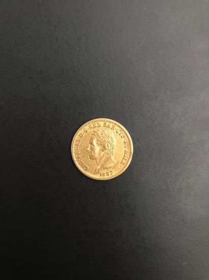 null 14 pièces en or de 20 francs belges à l'effigie de Léopold II.

7 pièces de...