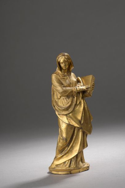 null École italienne vers 1600.

Sainte femme tenant un livre.

Bronze doré.

Haut....