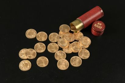 null Vingt-cinq pièces en or de 20 francs suisses 1935.

On joint un porte-louis...