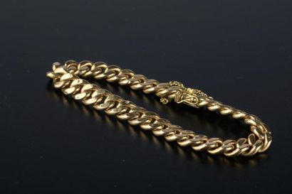 null Bracelet gourmette en or jaune 18k à maillons limés (chocs).

Long. : 18,7 cm...