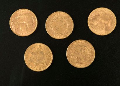 null Cinq pièces en or de 20 francs français 1864, 1877, 1979 et 1906 (x2).

Lot...