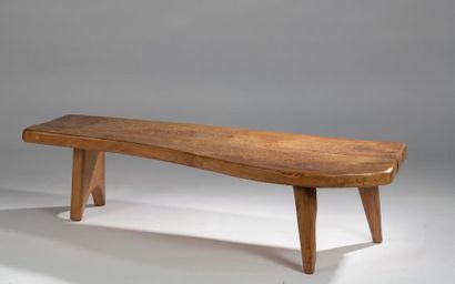 null Charles FLANDRE (XXe siècle).

Table basse en bois naturel reposant sur quatre...