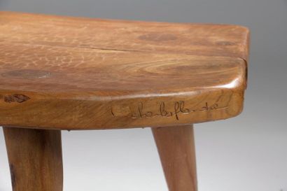 null Charles FLANDRE (XXe siècle).

Table basse en bois naturel reposant sur quatre...