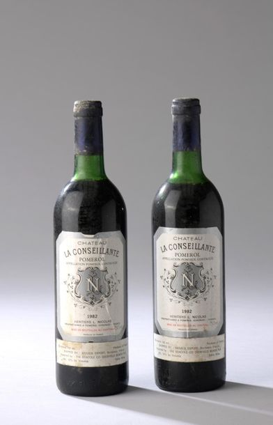 null 2 bouteilles CH. LA CONSEILLANTE, Pomerol 1982 (elt, es, étiquette export U.S.,...