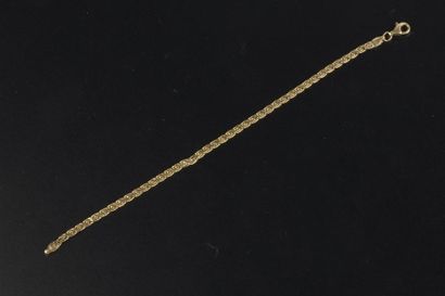 null Bracelet en or jaune 18k à maille corde plate.
Long. : 20,5 cm - Poids : 5 ...