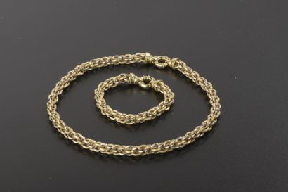 null Parure en or jaune et gris 18k comprenant un collier et un bracelet alternant...