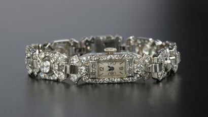 null Montre bracelet de dame en or gris 18k, le bracelet  sept maillons géométriques...