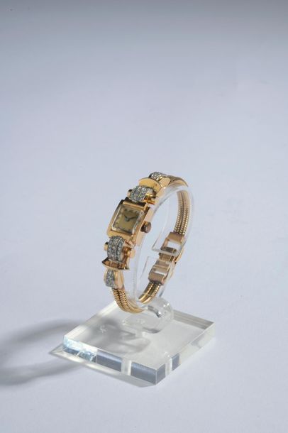 null Montre bracelet de dame en or rose 18k et platine, le bracelet à deux mailles...