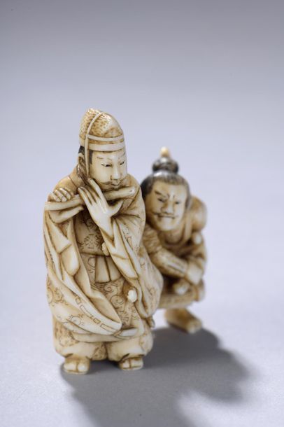 null JAPON, fin de l'époque ÉDO (1603-1868). 
Netsuke signé représentant deux exorcistes...