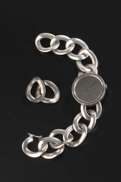 null LANCEL
Montre bracelet de dame en argent, la montre de forme ronde, cadran miroir,...