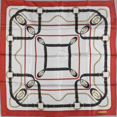 null CARTIER
Foulard en soie à motif de chaînette dorée et ceintures sur fond crème,...