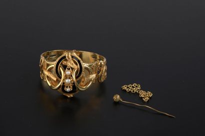 null Large bracelet articulé en or jaune 18K, à décor de brindilles sinueuses attachées...