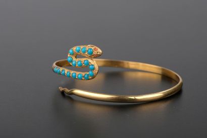 null Bracelet serpent rigide en or jaune 18K, serti de dix-sept cabochons en turquoise,...