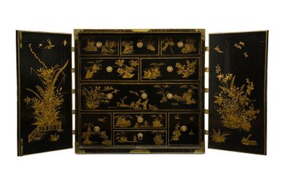 null Lacquer cabinet with gold decoration on a black background decorated with animated...