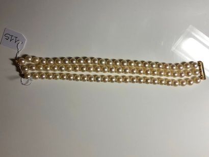 Bracelet of three rows of cultured pearls,...