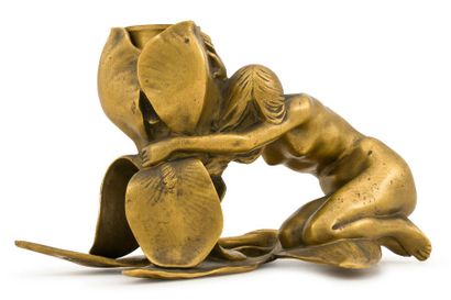 MauRicE BOuVal (1863-1916) Candlestick in gilt bronze representing a woman and a...