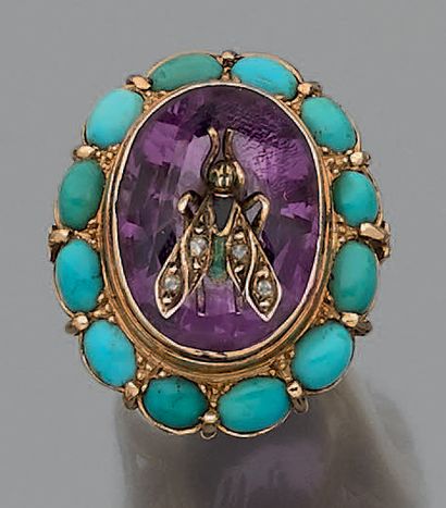 null Oval ring in yellow gold (750 thousandths) centered by an amethyst (grindings)...