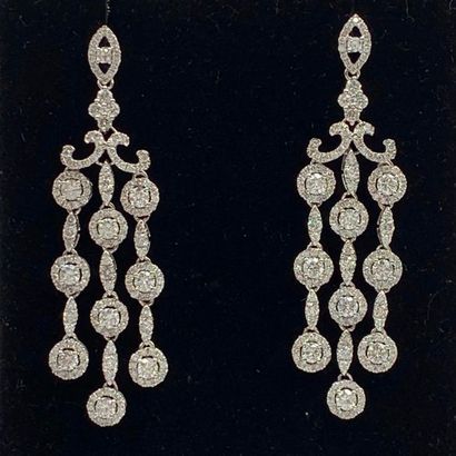 null Pair of EAR PENDANTS "garlands" in 14 carat (585 thousandths) white gold, openwork,...