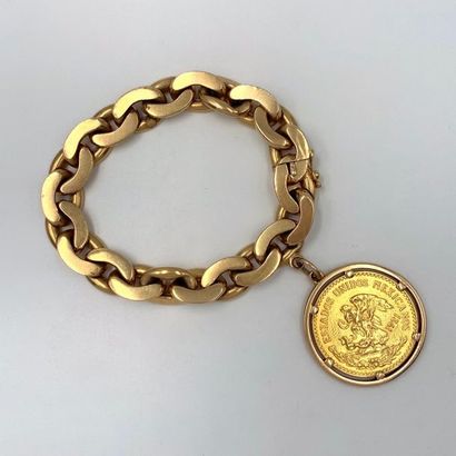 null BRACELET gourmette en jaune (750) à maille ovale plate, retenant une pièce de...