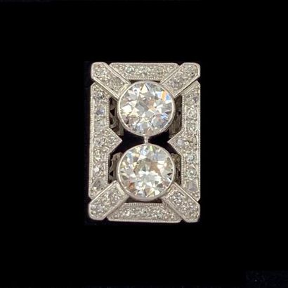 null DEBRIS (formerly RING) rectangular platinum (950) openwork, centered with two...