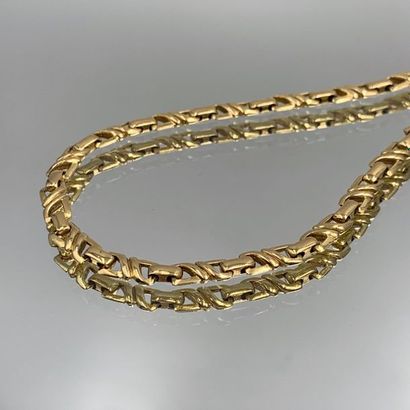 NECKLACE in yellow gold (750) with carved...