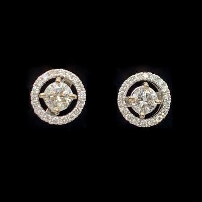 Pair of circular EAR CLOUSES, the removable...