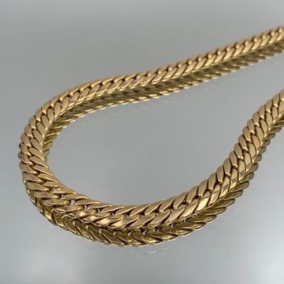 null NECKLACE in yellow gold (750) with flat chain link. 
Length : 46,5 cm. Weight...