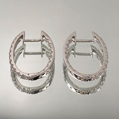 null Pair of EARRINGS "petites créoles" in white gold (750) set with an alignment...