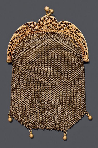 A yellow gold (750‰) chainmail wallet. The...