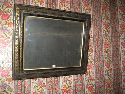 null Miroir en pâte dorée à profil inversé.Style Louis XIV.