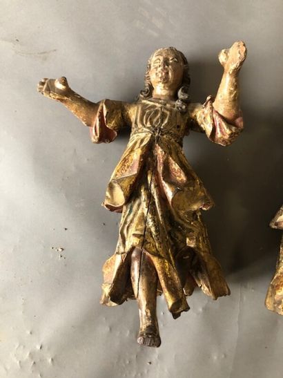 null Paire de personnages en bois polychrome

Début du XVIIIème siècle

H. 38 cm

Accidents...