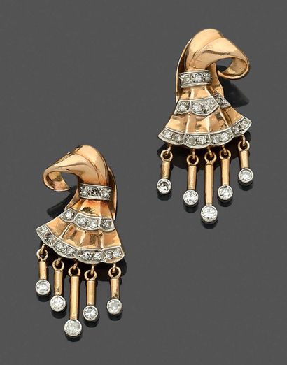  Pair of 14-carat platinum (min. 800%) and pink gold (750‰) "bell" EAR CLIPS, set...