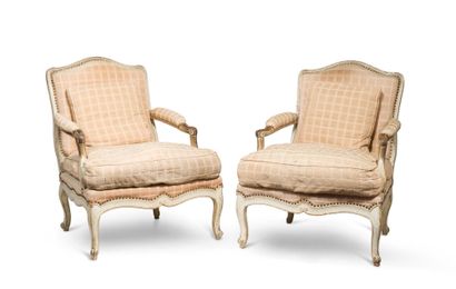 null PAIR OF LARGE LOW CHAIRS with flat back in beige moulded wood, the legs and...