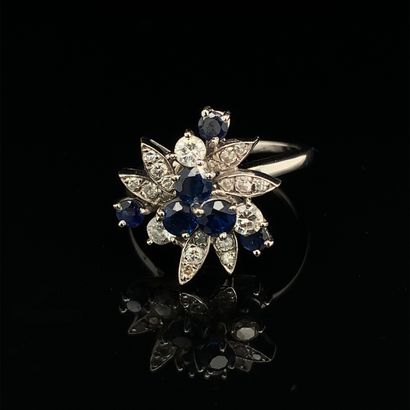 null White gold (750‰) "cocktail" ring set with six sapphires, studded with brilliant-cut...