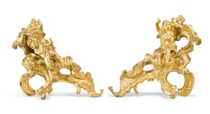 null Pair of chased, openwork and gilt bronze andirons representing two child musicians,...