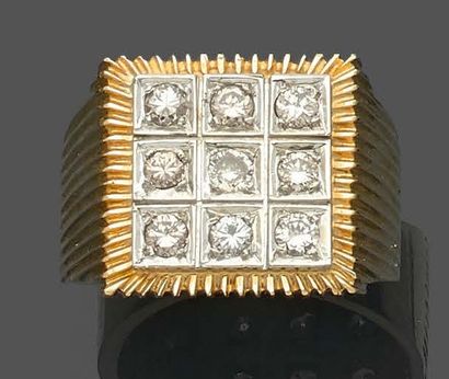  Square "signet ring" ring in yellow and white gold (750‰), set with nine brilliant-cut...