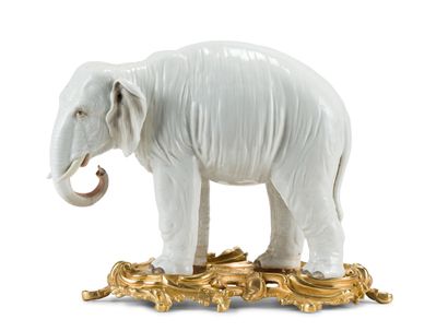 Manufacture de Samson ELEPHANT in white enamelled porcelain standing on an oval Rocaille...