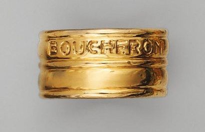 null Bague en or jaune faite d'un large anneau double. Signée Boucheron Paris. Poids...